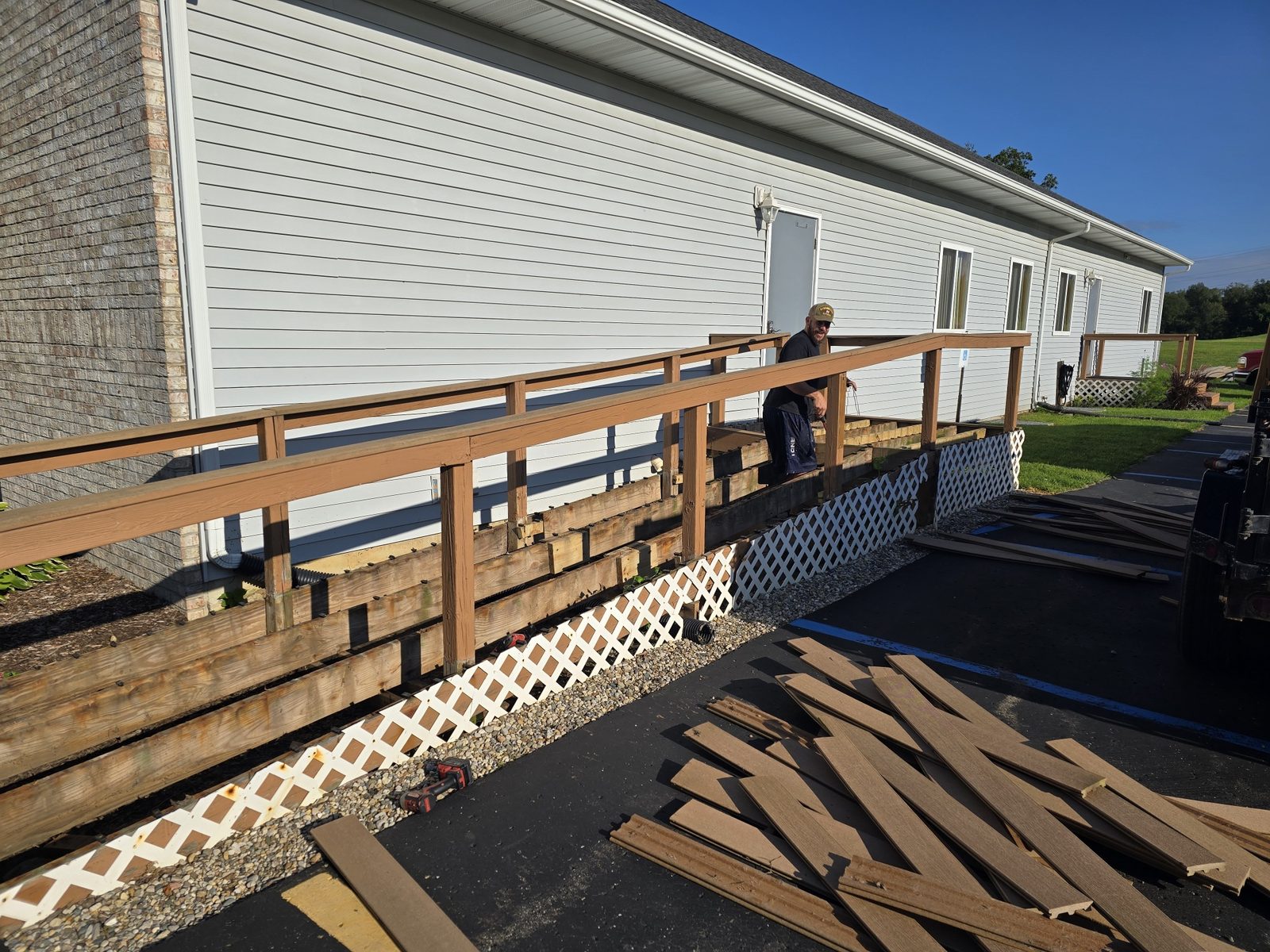 Weathered decking stripped from an old wheelchair ramp before a rebuild in Southwest Michigan