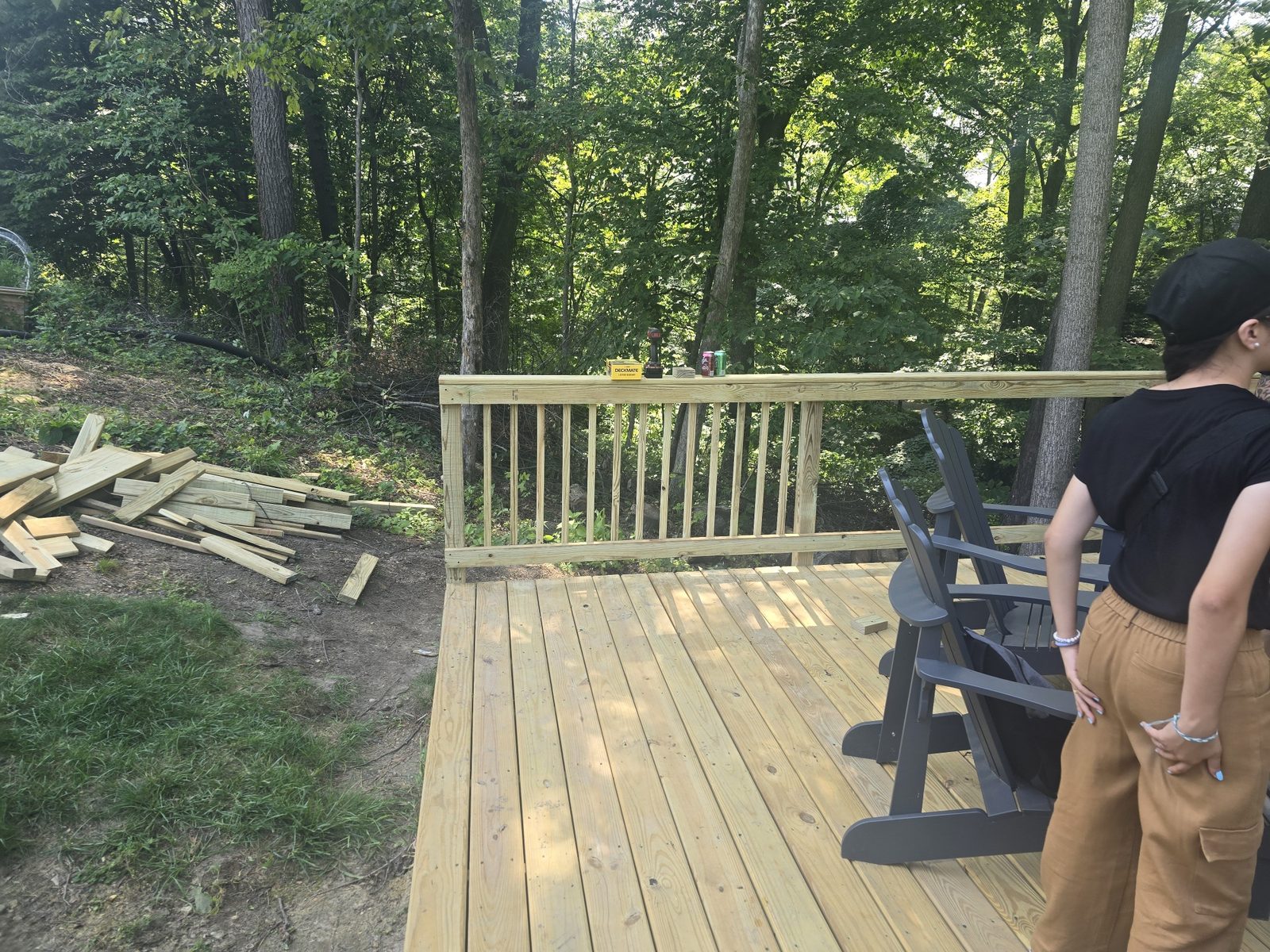 Wood railings being added to a new backyard deck in Southwest Michigan