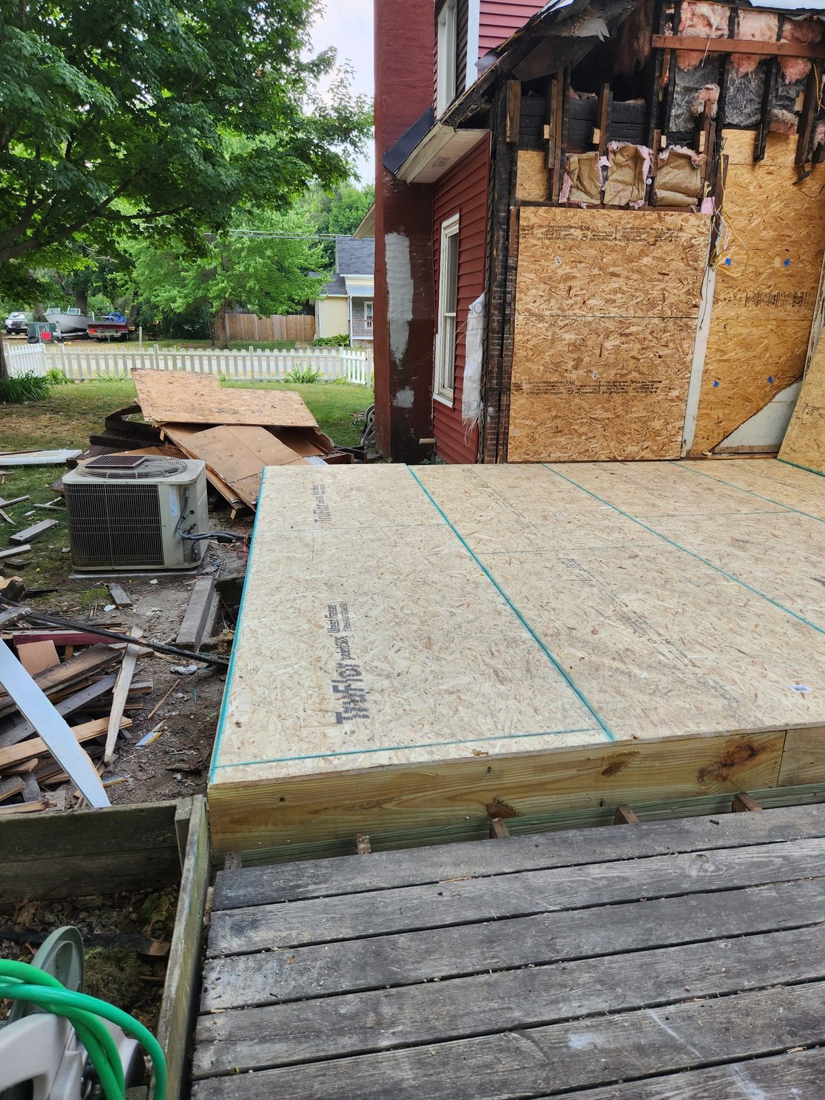 New floor deck built for the rebuilt rear section of a house in Southwest Michigan