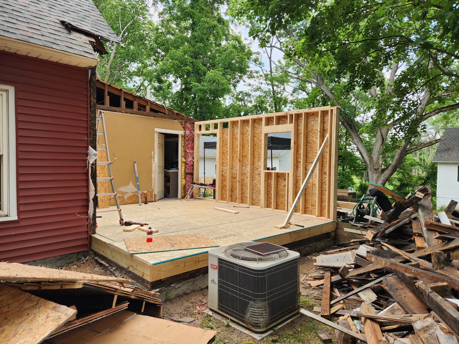 New walls framed on the rebuilt rear section of a house in Southwest Michigan