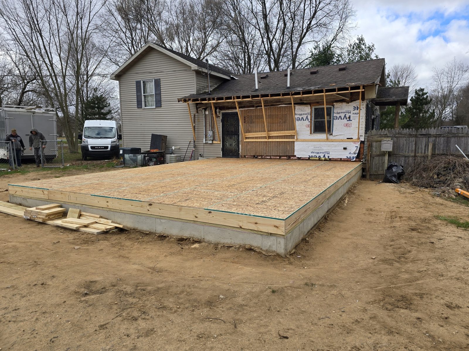 Subfloor sheathing installed over the floor framing of a room addition in Southwest Michigan