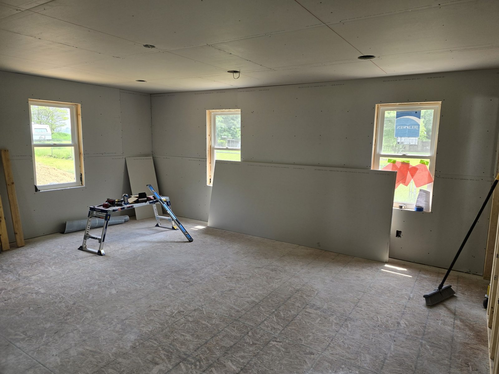Drywall hung inside a new room addition in Southwest Michigan