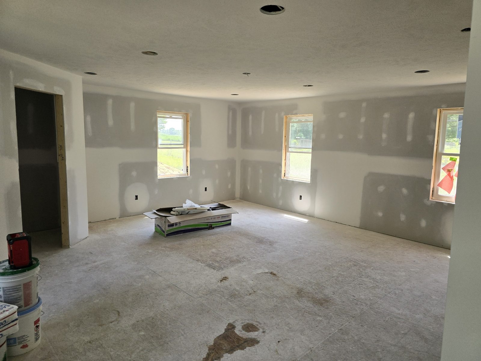 Drywall taped and mudded in a room addition in Southwest Michigan, ready for paint